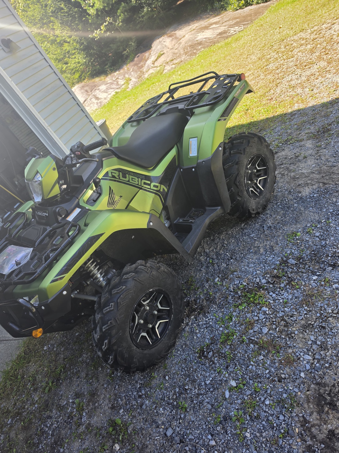 Side view of the 2020 Honda Foreman Rubicon Deluxe